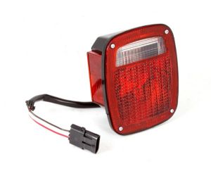 Omix-ADA Tail Light With Black Housing Left Hand For 1987-90 Jeep Wrangler 12403.11