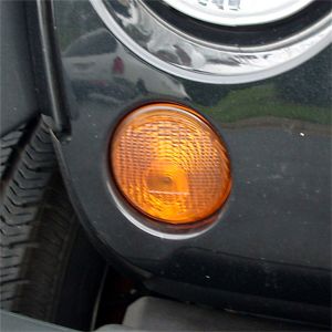 Omix-ADA Signal Light Front Passenger Side For 2007-13 Jeep Wrangler 12405.24